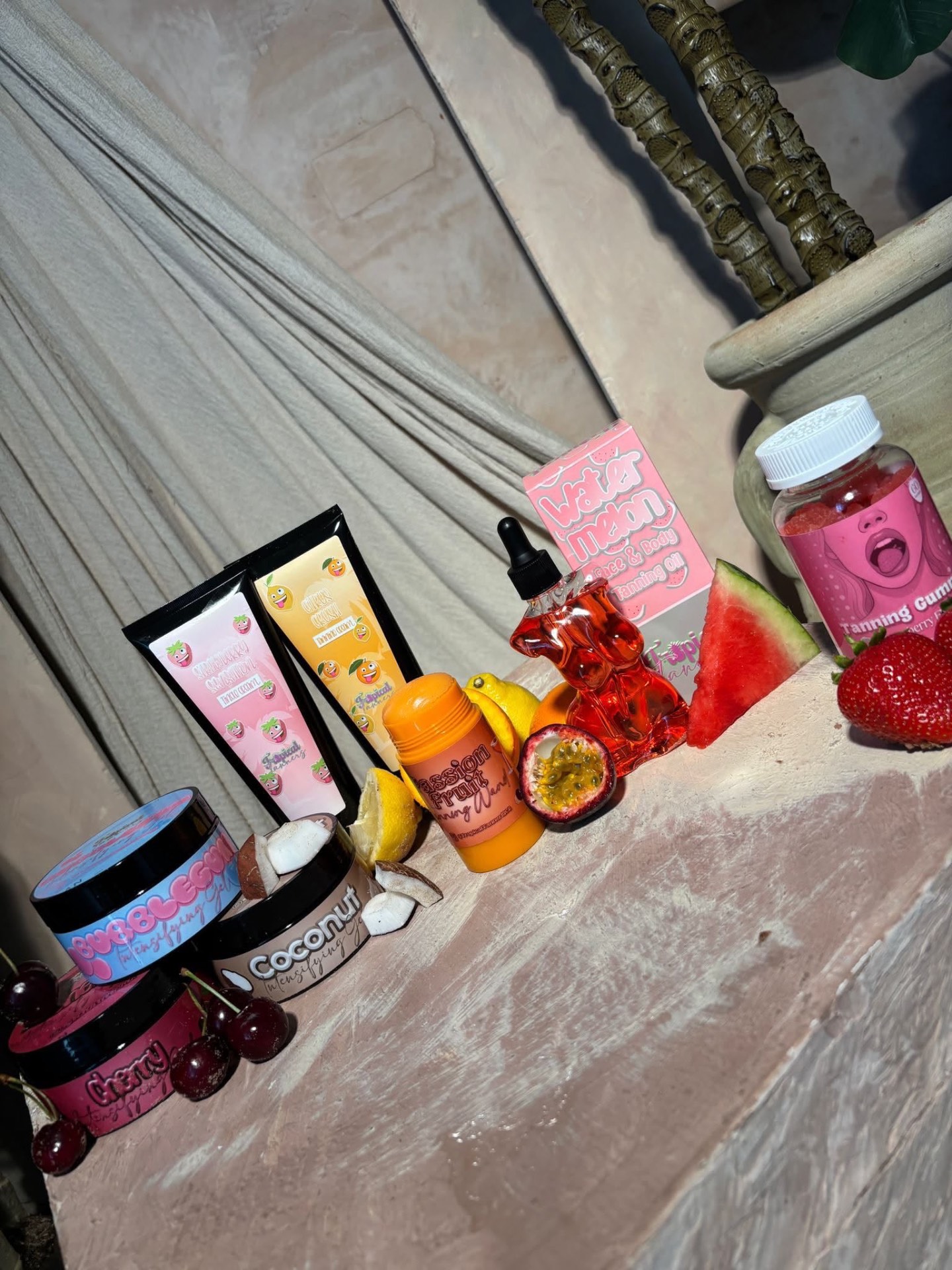 Tropical Tanner collection with fresh fruit